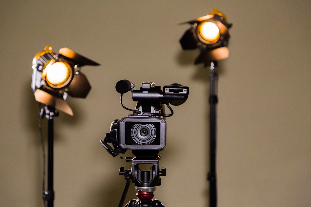 A video camera and two lights