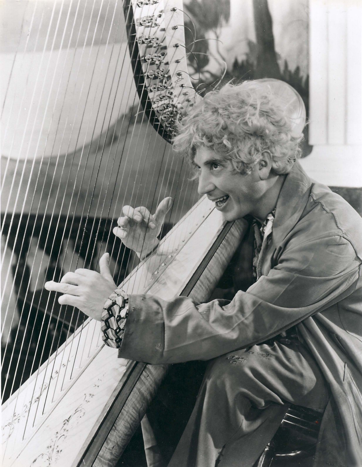 Harpo Marx playing the harp in Animal Crackers, 1930