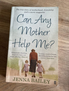 A book called 'Can any mother help me?' by Jenna Bailey. Picture of a woman holding two children by the hand